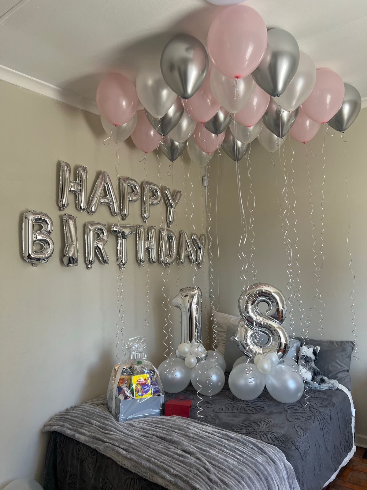 Pink and silver 18th birthday room setup